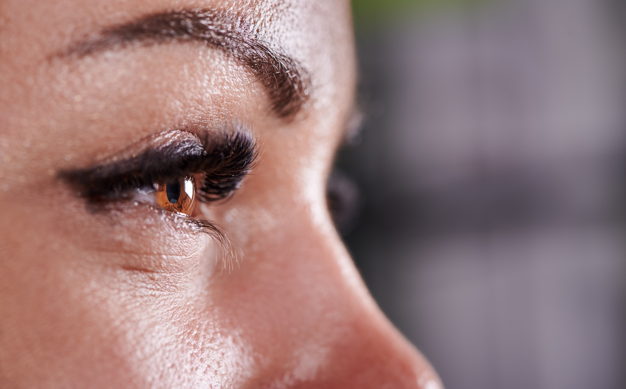 Female eye with beautiful long lashes.